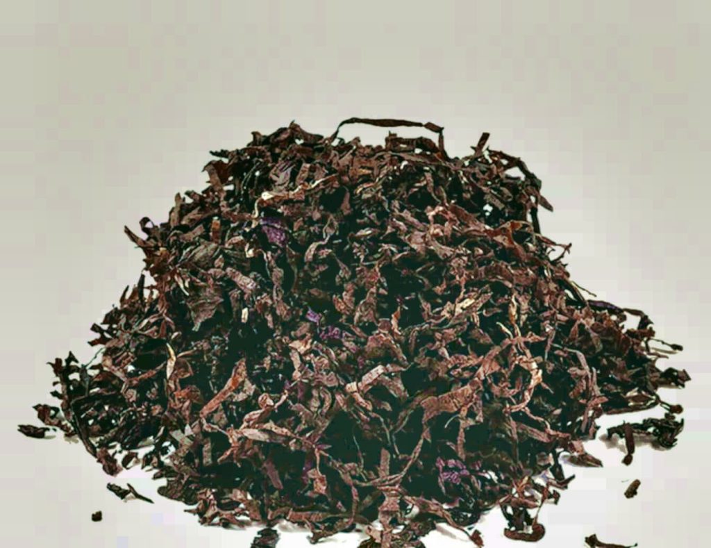 Завораживающий крупный план листьев табака Perique, раскрывающий их интригующую текстуру